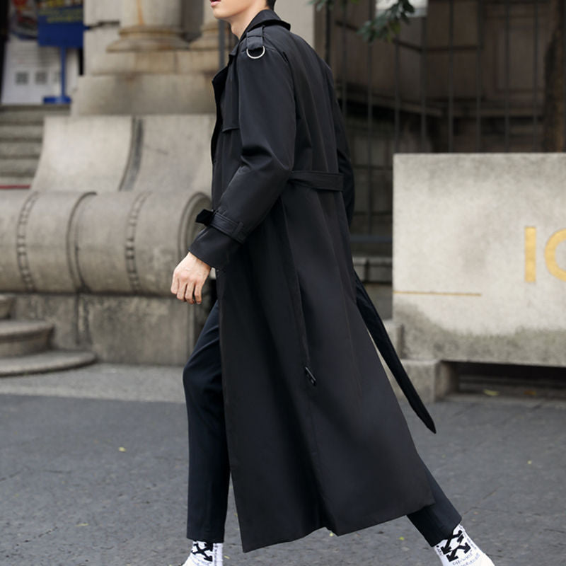 Men's long double-breasted trench coat with notched lapel, belt and flap pockets