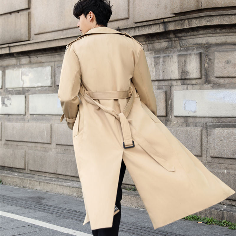 Men's long double-breasted trench coat with notched lapel, belt and flap pockets