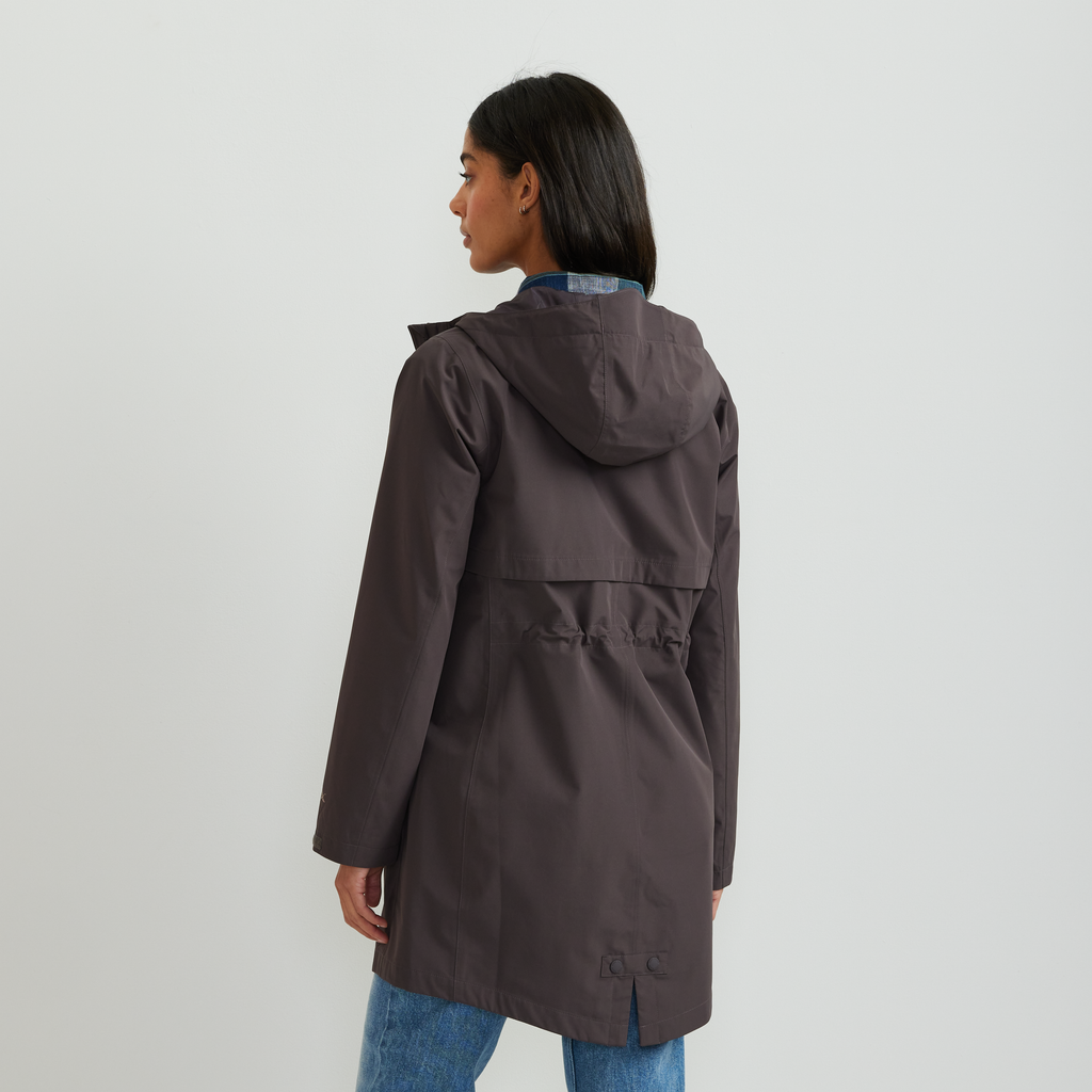 Women's hooded mid-thigh trench coat with long sleeves and zip fastening