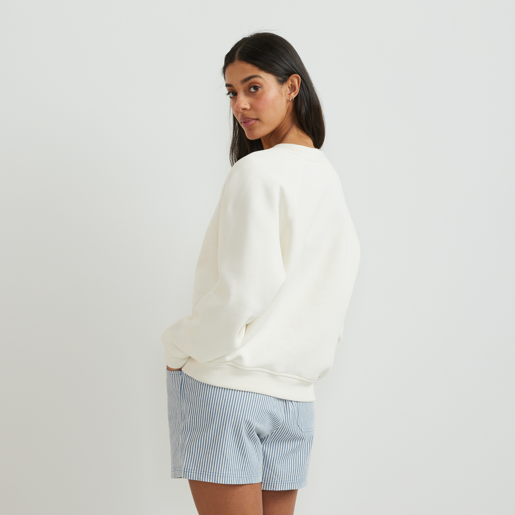 Women's crew neck sweatshirt with long raglan sleeves and ribbed trims