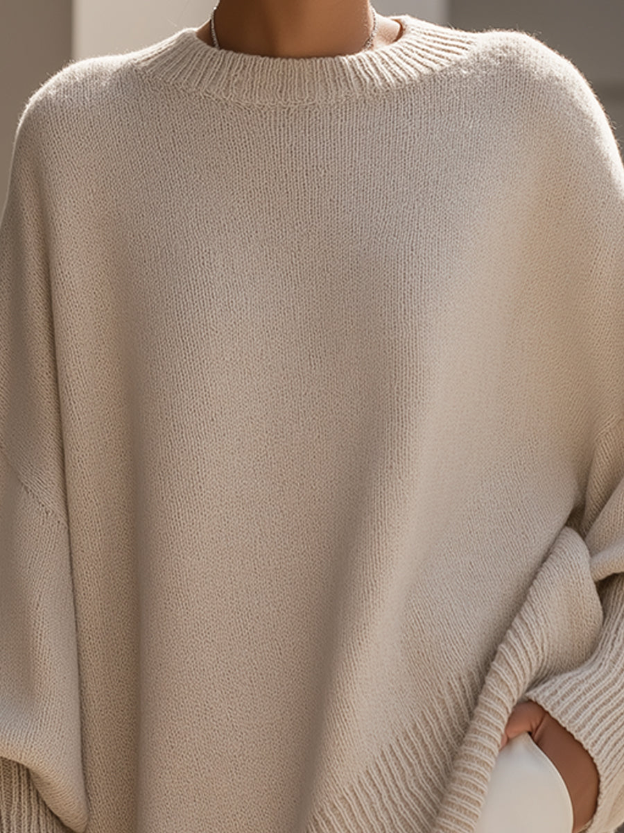 Oversized knit sweater with crew neckline and long sleeves