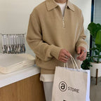 Ribbed quarter-zip sweater with polo collar and long sleeves
