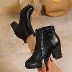 Women's ankle boots with textured panels, high block heels, side zips and lugged soles