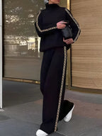 Women's black high neck sweatshirt with geometric sleeve trim