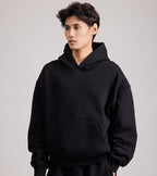 Men's black pullover hoodie with hood and front pouch pocket