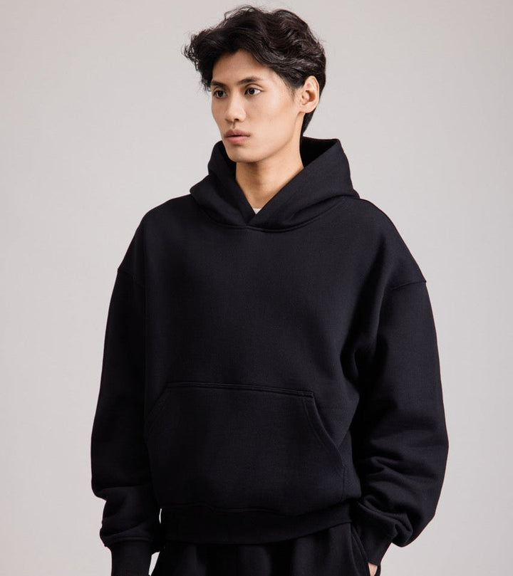 Men's black pullover hoodie with hood and front pouch pocket