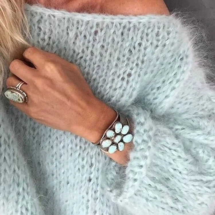 Women's textured knit jumper with round neck and long sleeves