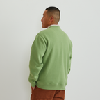 Men's green crew-neck sweatshirt with vintage Sport Shop graphic and long sleeves