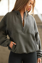Women's oversized half-zip longline sweatshirt with stand collar