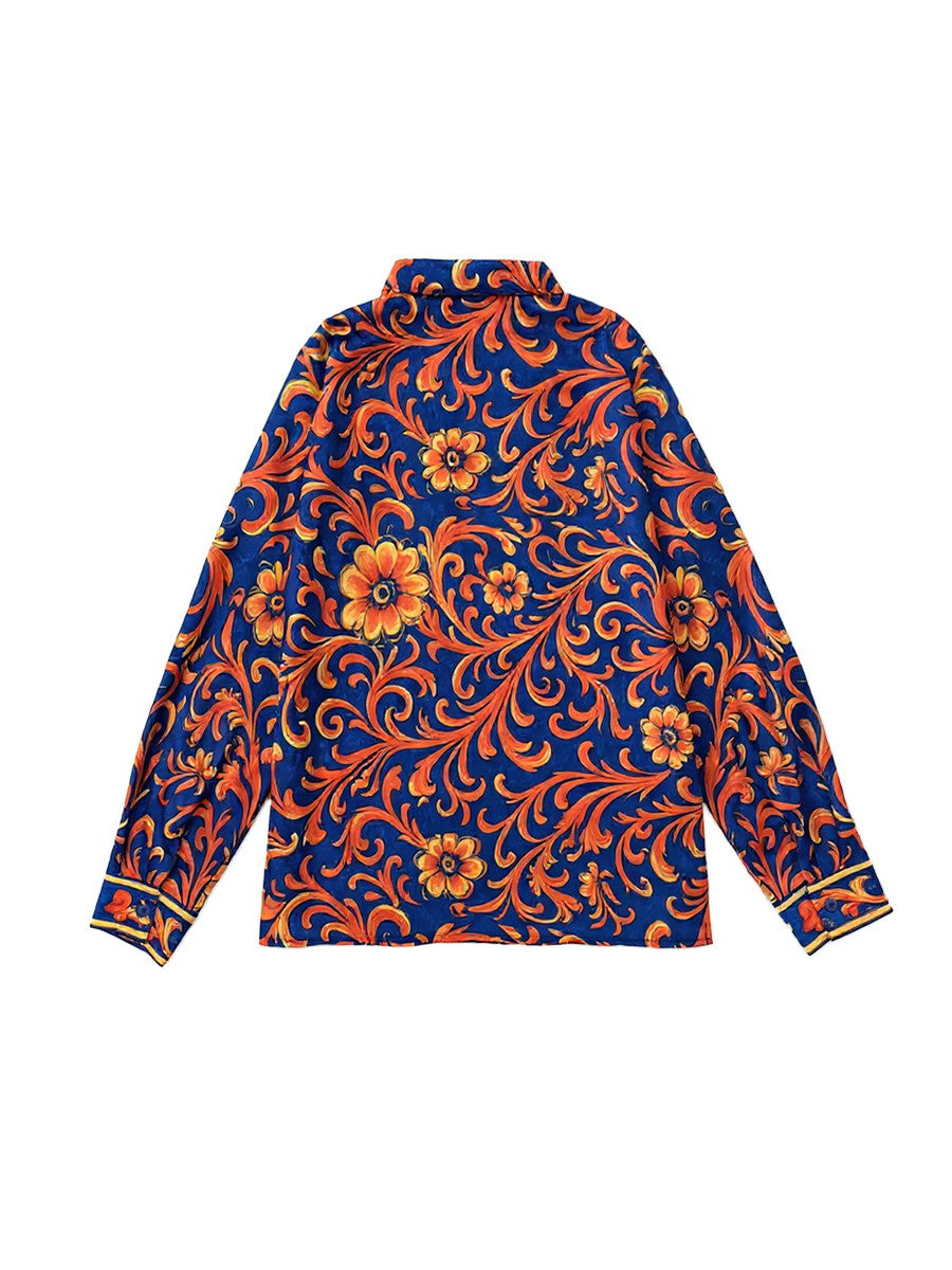 Women's blue floral button blouse with pointed collar and long sleeves