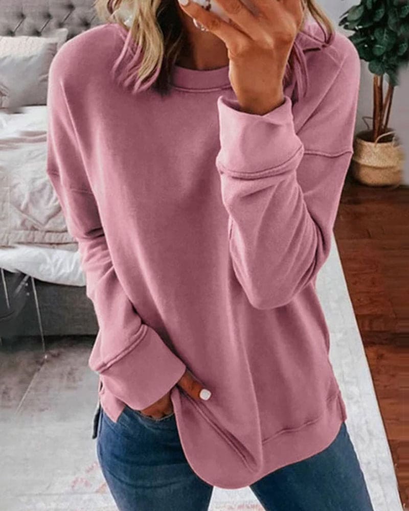 Women's crew neck sweatshirt with curved side slit hem