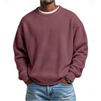 Men's relaxed textured crew neck sweatshirt with long sleeves and ribbed trims