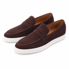 Men's penny loafers with moc toes, strap detail and white flat soles