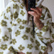 Women's floral fleece hoodie with hood, long sleeves, front zip and pouch pocket