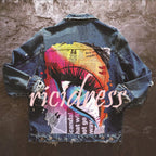 Women's denim jacket with colourful graphic eye print on the back