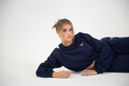 Women's navy cropped crew neck sweatshirt with long sleeves