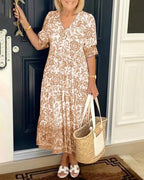 Women's floral V-neck midi dress with three-quarter sleeves