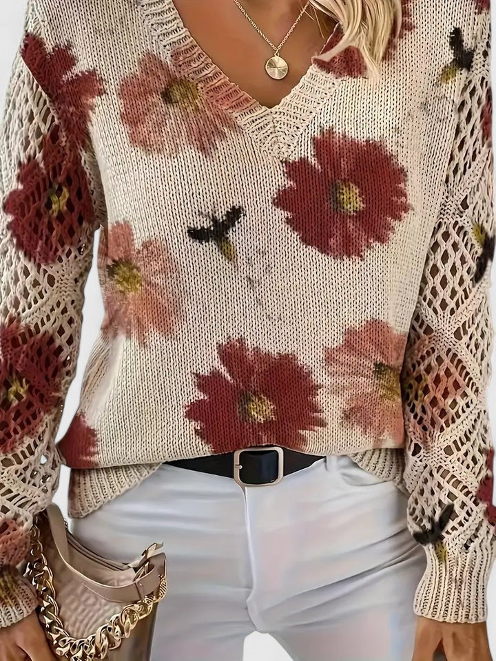 Women's floral V-neck sweater with long sleeves and open-knit sleeve panels