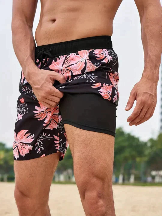 Men's slim fit swim shorts with printed pattern and interior lining, drawstring waist
