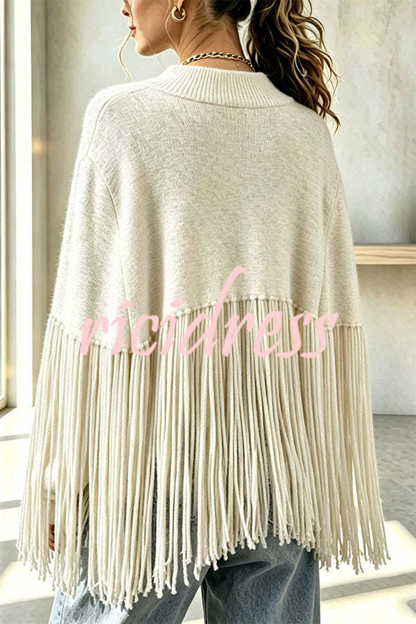 Women's knit cape sweater with crew neck and long tassel hem