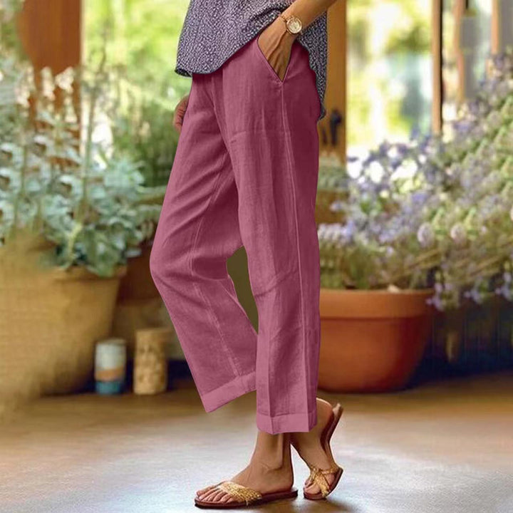 Women's cropped wide-leg trousers with side pockets and cuffed hems
