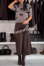 Women's brown knit crop top with dark bow details and short sleeves
