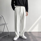 High-waist pleated straight-leg trousers with belt loops