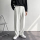 High-waist pleated straight-leg trousers with belt loops