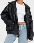 Women's oversized bomber jacket with collared neckline, zip front and elasticated hem