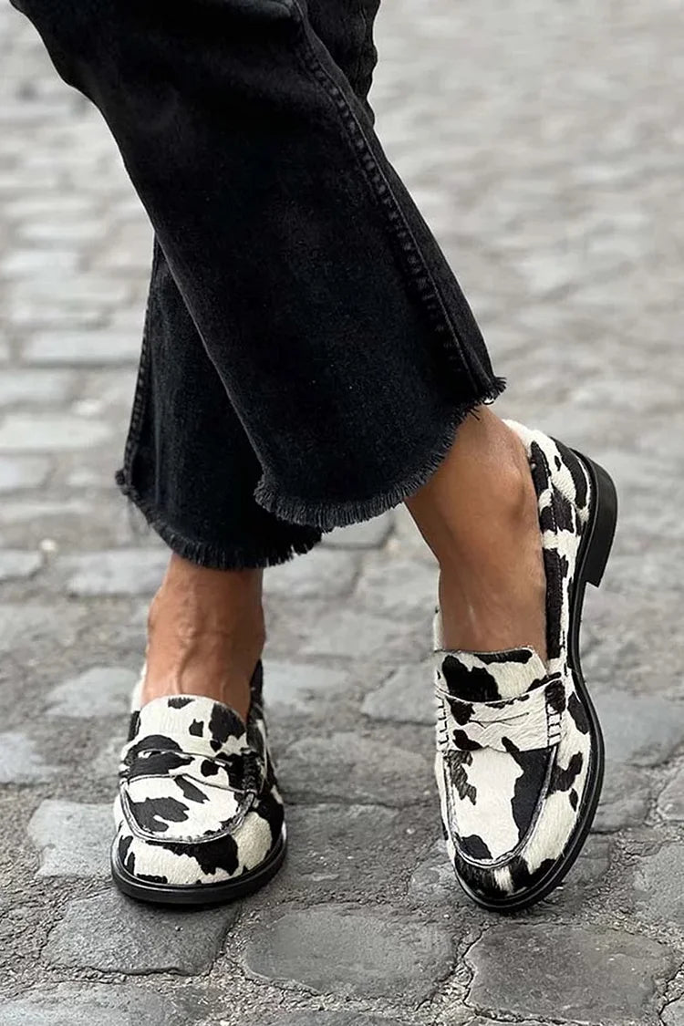 Women's black and white cow print patchwork loafers