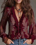 Women's paisley blouse with ruffled V-neck and sheer long sleeves