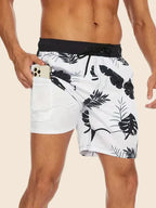 Men's slim fit swim shorts with printed pattern and interior lining, drawstring waist