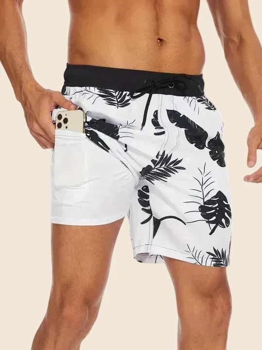Men's slim fit swim shorts with printed pattern and interior lining, drawstring waist
