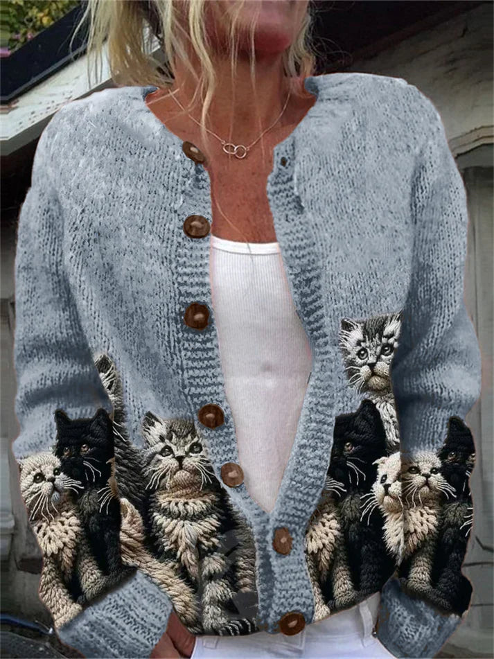 Women's button-front cardigan with a repeated cat print and long sleeves