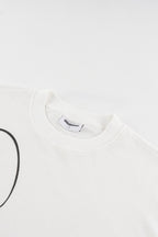 White waffle sweatshirt with black script graphic and long sleeves