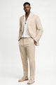 Men's tailored two-piece suit with structured blazer and matching trousers