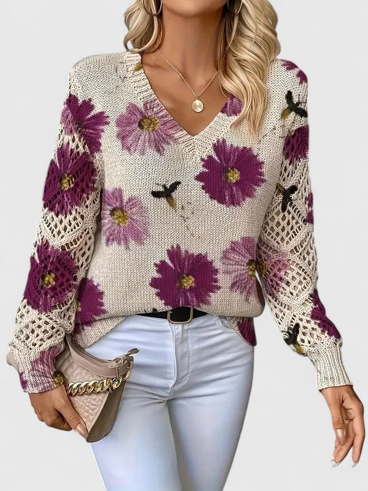 Women's floral V-neck sweater with long sleeves and open-knit sleeve panels
