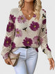 Women's floral V-neck sweater with long sleeves and open-knit sleeve panels