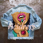 Denim jacket with colourful Halloween graphic on the back