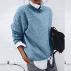 Women's crewneck knit sweater with long sleeves and relaxed fit