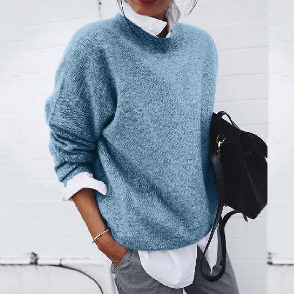 Women's crewneck knit sweater with long sleeves and relaxed fit