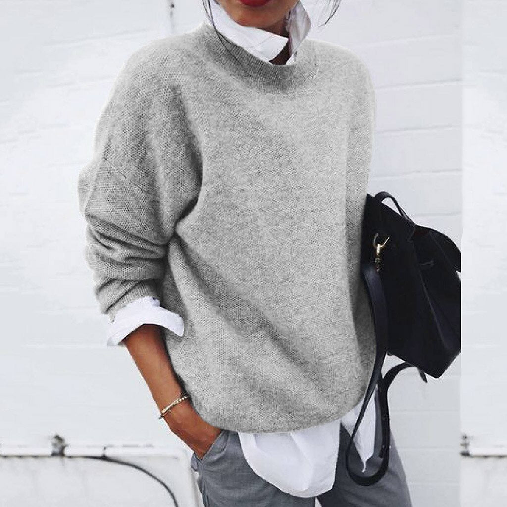 Women's crewneck knit sweater with long sleeves and relaxed fit