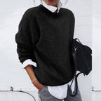 Women's crewneck knit sweater with long sleeves and relaxed fit