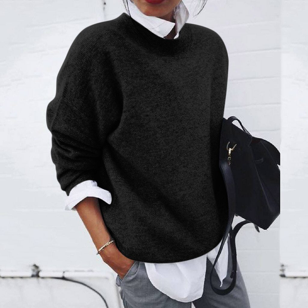 Women's crewneck knit sweater with long sleeves and relaxed fit