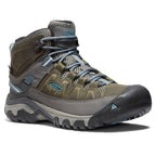 Green and grey lace-up waterproof hiking boots with chunky lugged soles