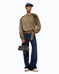 Women's green crew neck sweatshirt with embellished shoulder panels