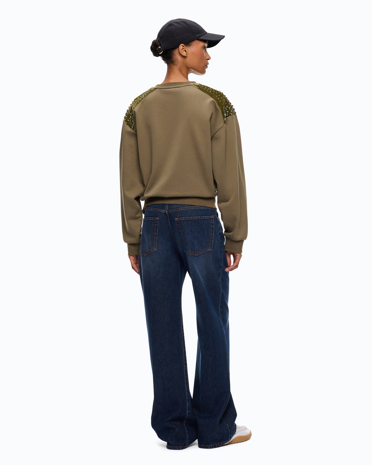 Women's green crew neck sweatshirt with embellished shoulder panels