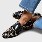Women's leopard print loafers with black strap and low heel