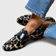 Women's leopard print loafers with black strap and low heel