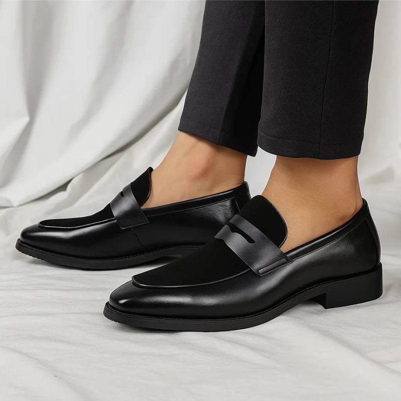 Men's navy and black penny loafers with almond toe and low heel